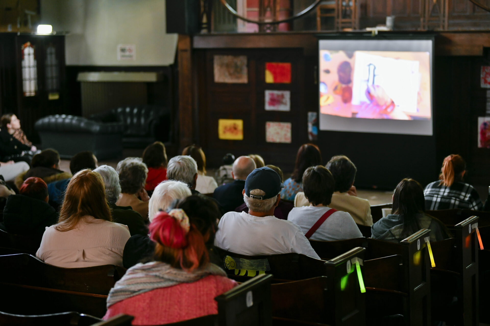 Audience members watching a Film Screening Event.